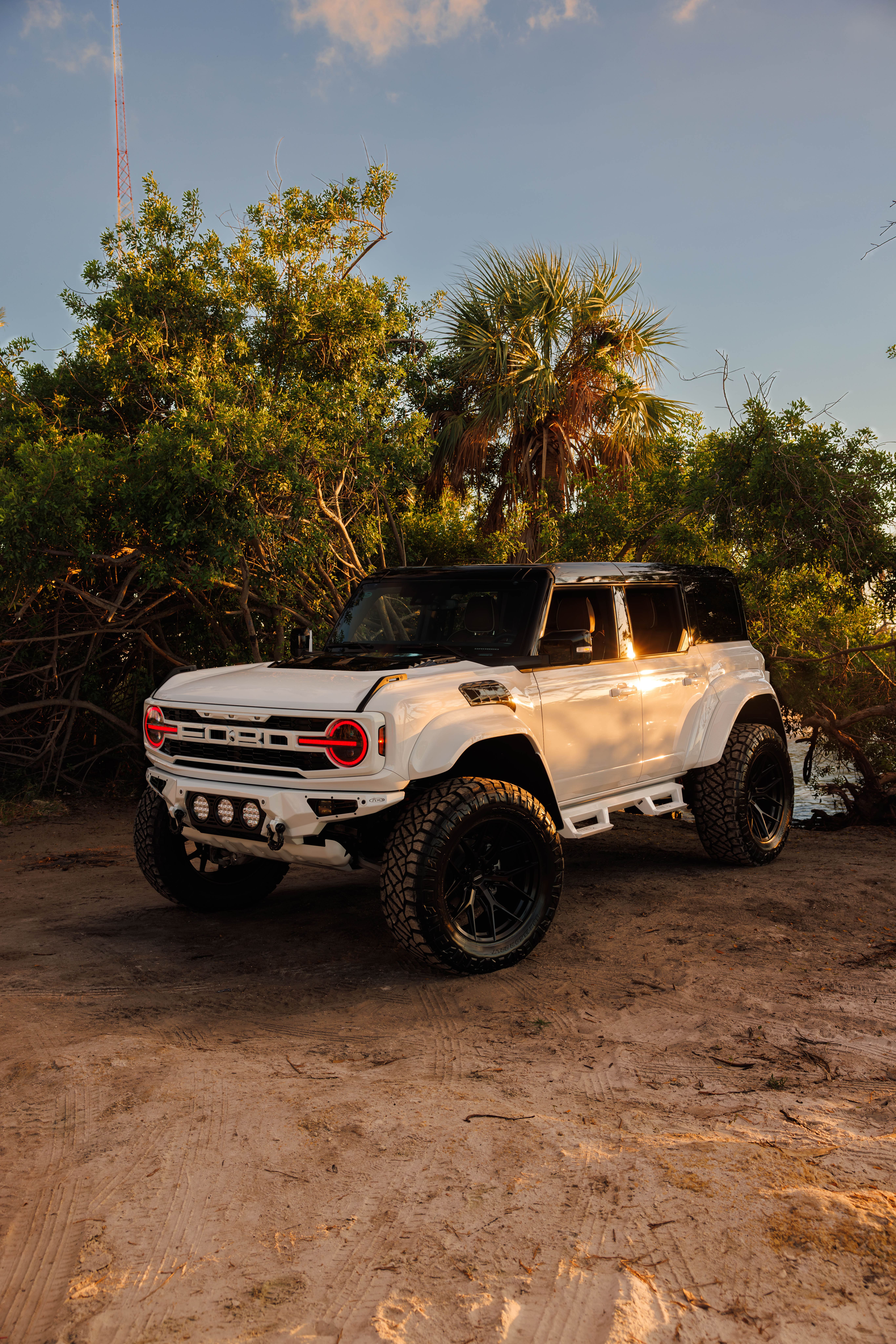 Customized Ford Bronco in natural setting