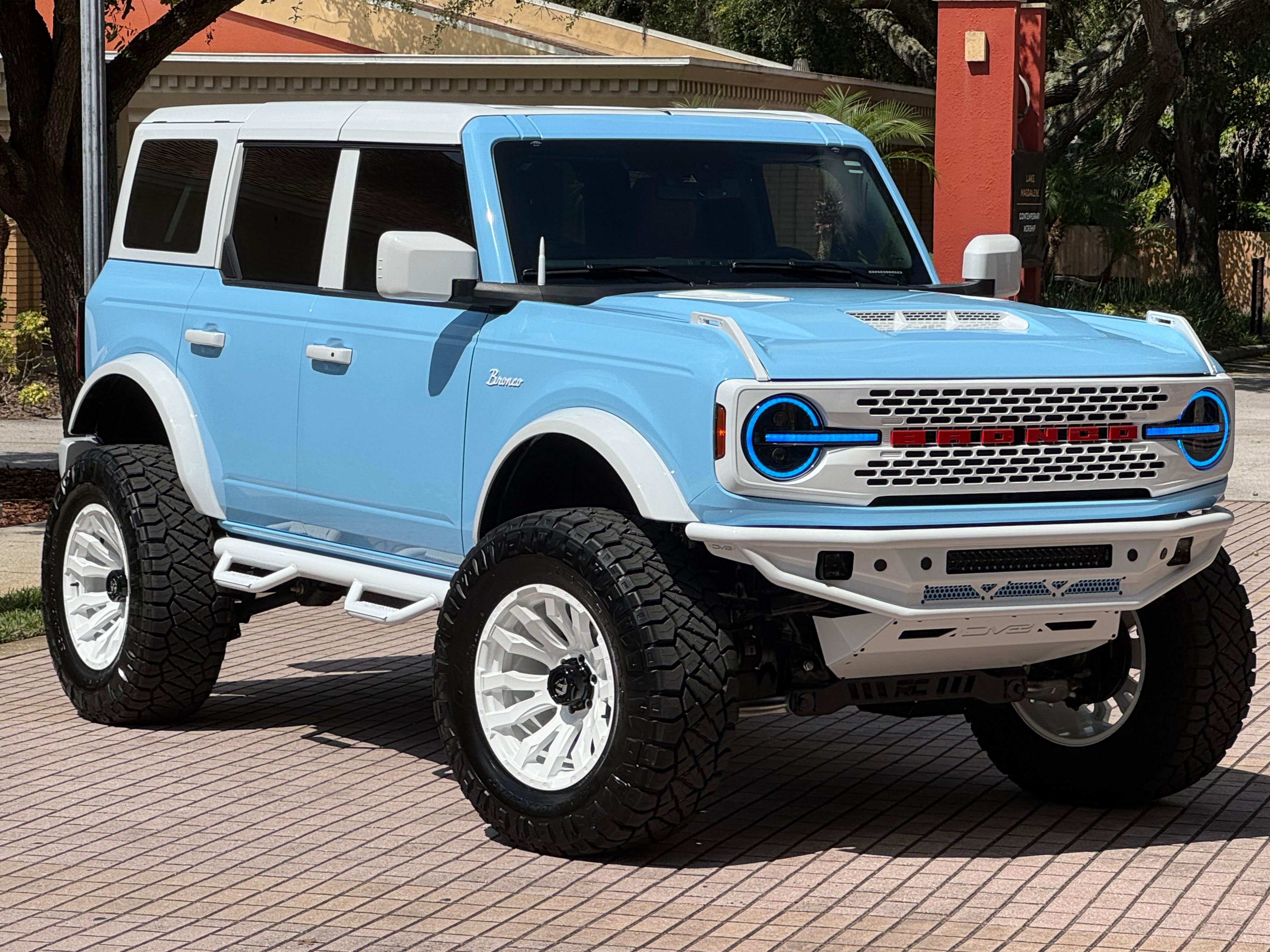 Customized Ford Bronco in natural setting
